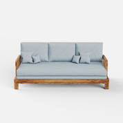 Sofa with wooden frame and light blue cushions on a white background