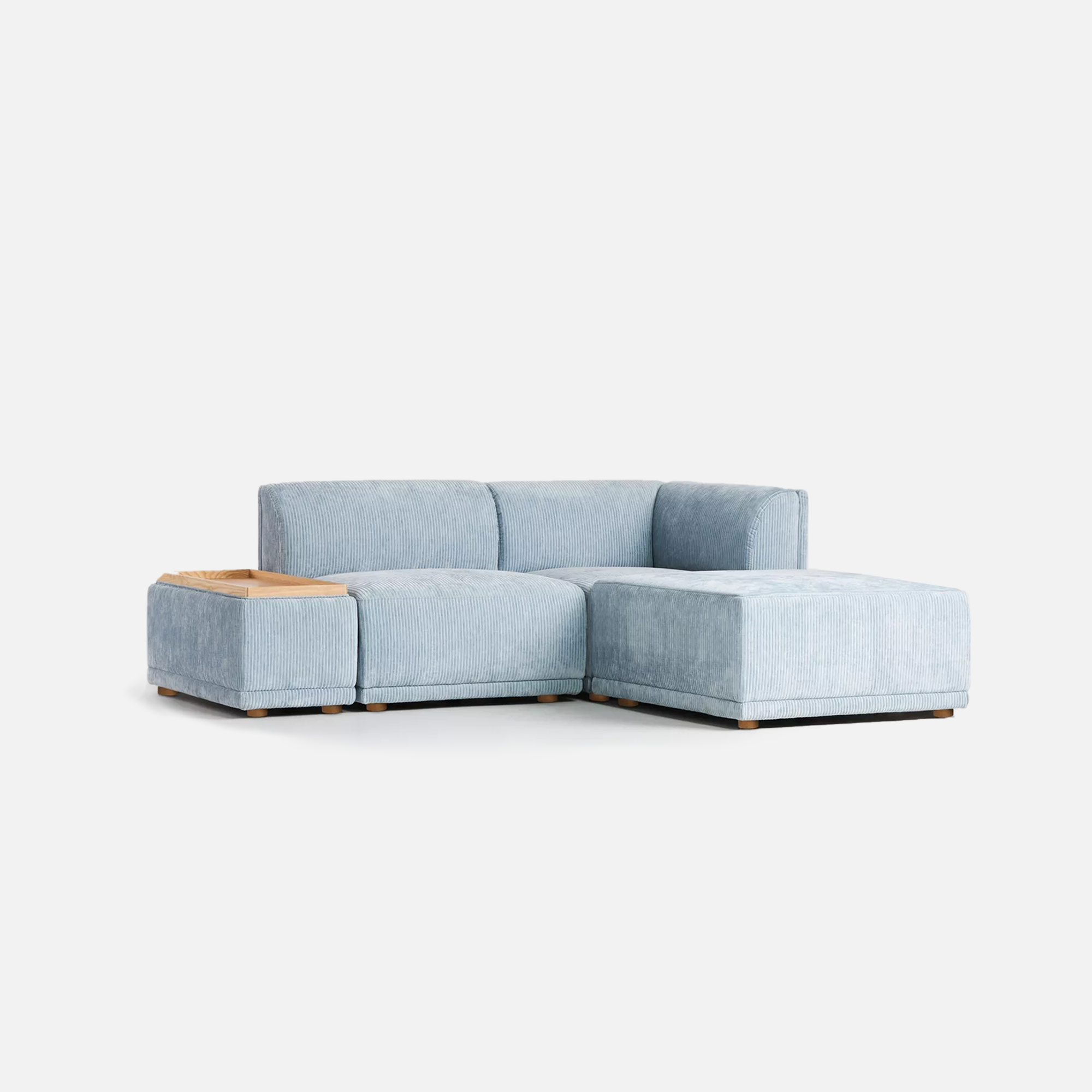 Light blue sectional sofa on a white background