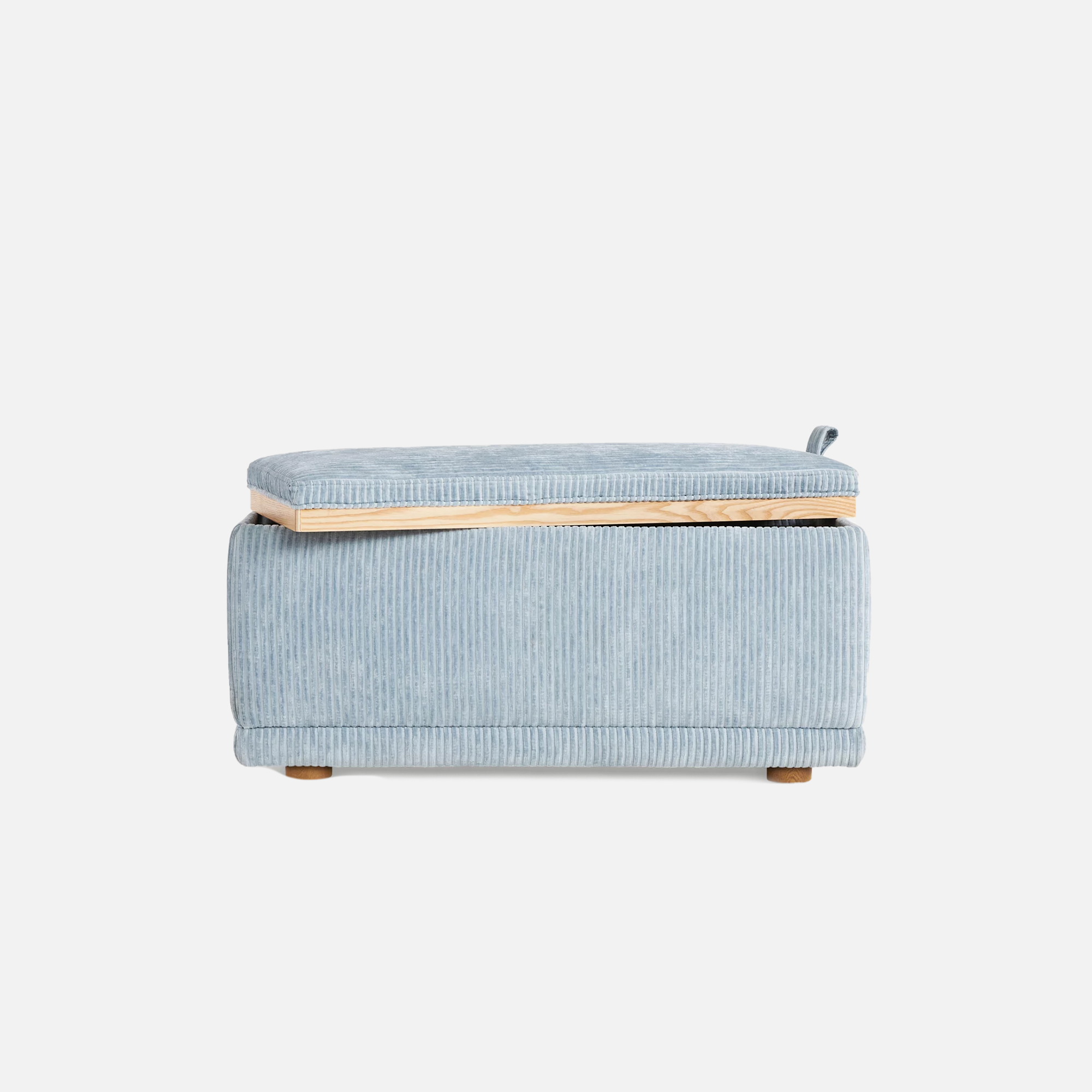 Light blue storage ottoman on white background