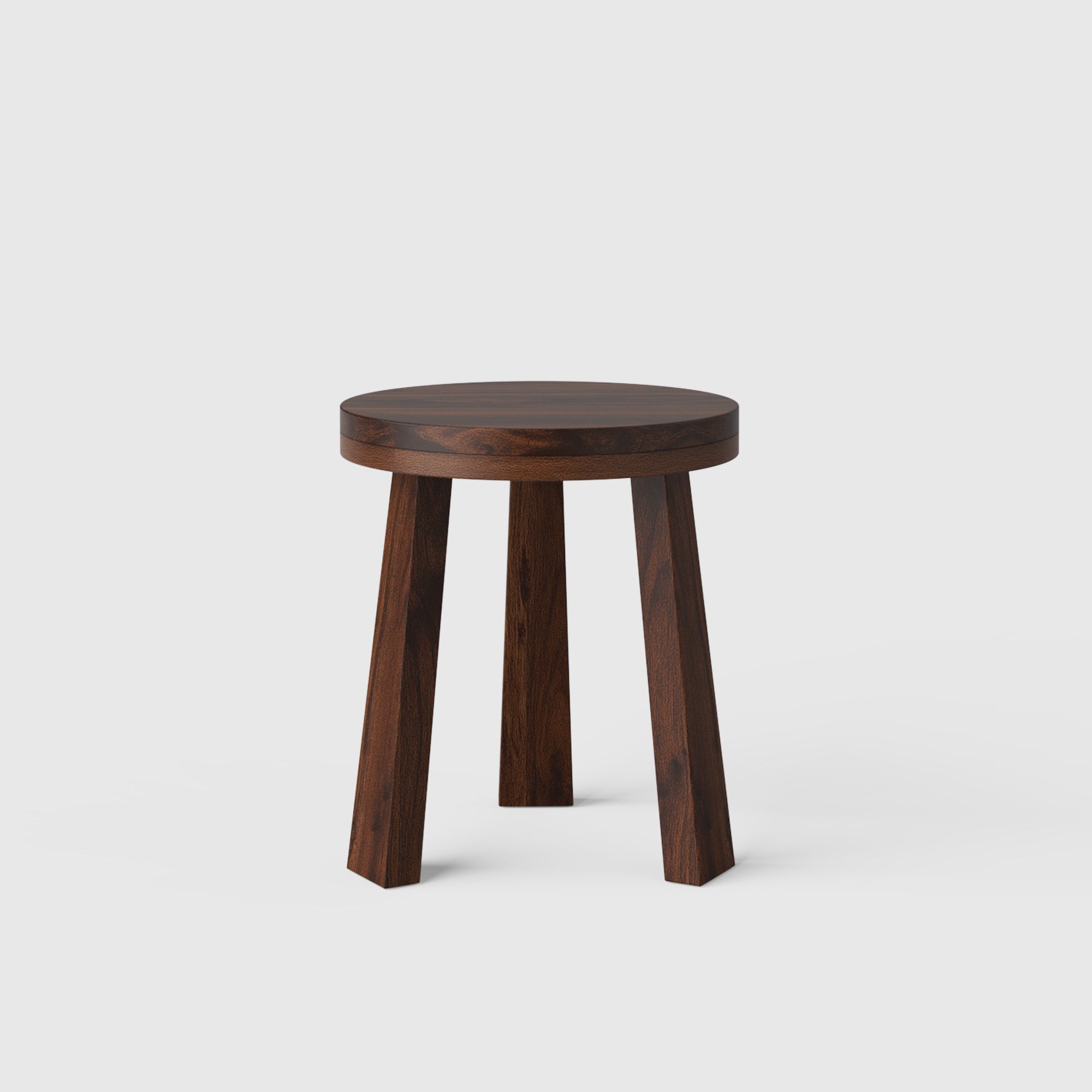 Wooden stool with three legs on a white background